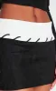 Black Faux Suede Contrast Foldover Stitch Detail Mini Skirt sold by Pretty Little Thing