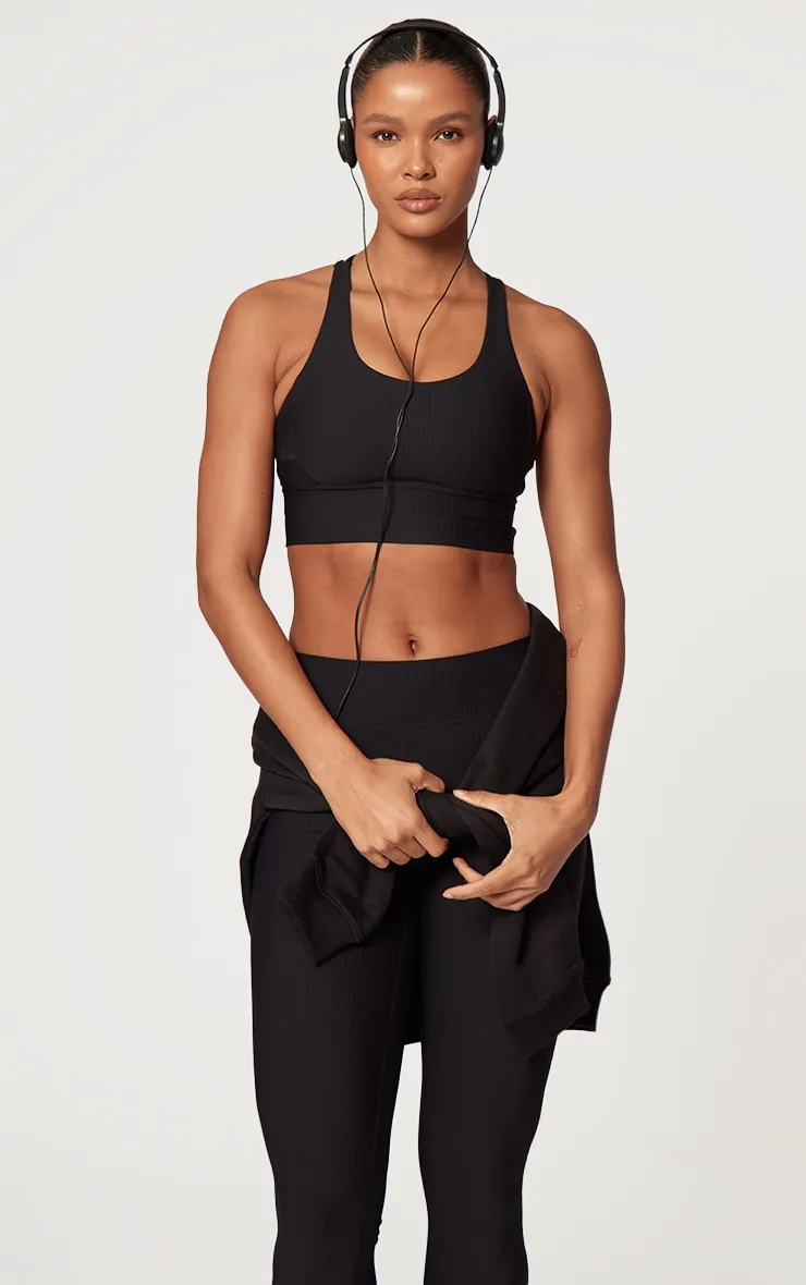 Black Active Rib Strappy Back Sports Bra sold by Pretty Little Thing