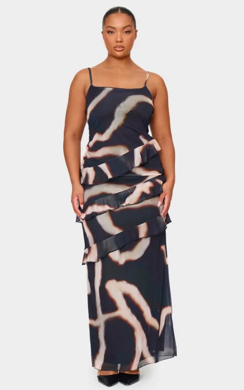 Plus Monochrome Printed Mesh Ruffle Maxi Dress sold by Pretty Little Thing