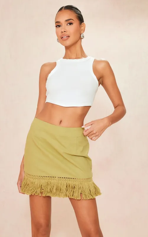 Khaki Tassel Fringe Hem Detail Mini Skirt sold by Pretty Little Thing