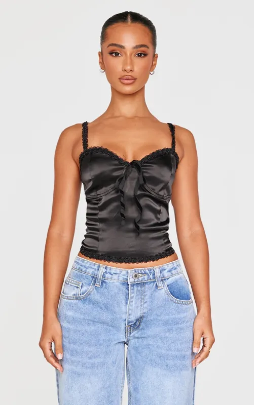 Petite Black Satin Rose Trim Detail Corset Top sold by Pretty Little Thing