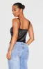 Petite Black Satin Rose Trim Detail Corset Top sold by Pretty Little Thing