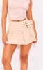 Petite Cream Micro Mini Pu Pleated Skirt sold by Pretty Little Thing