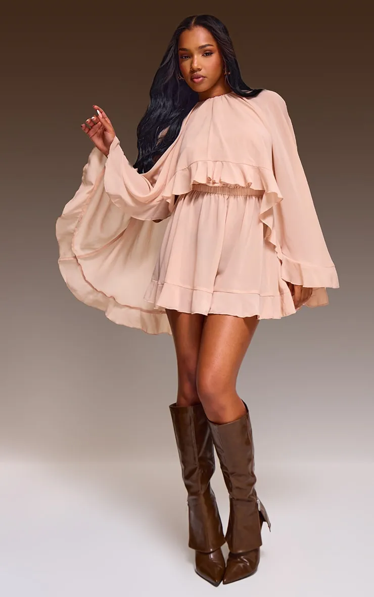 Light Nude Oversized Frill Hem Playsuit sold by Pretty Little Thing