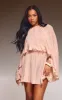 Light Nude Oversized Frill Hem Playsuit sold by Pretty Little Thing