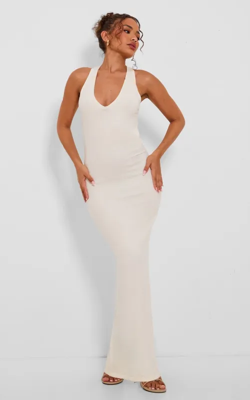Petite Cream Knit Open Back Cross Over Maxi Dress sold by Pretty Little Thing
