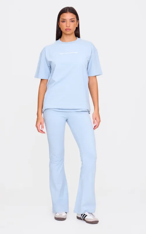 PRETTYLITTLETHING Pale Blue Printed Flared Trousers sold by Pretty Little Thing