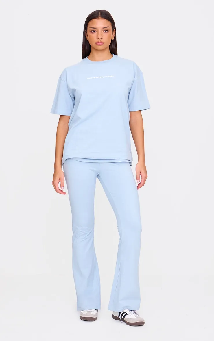 PRETTYLITTLETHING Pale Blue Printed Flared Trousers sold by Pretty Little Thing