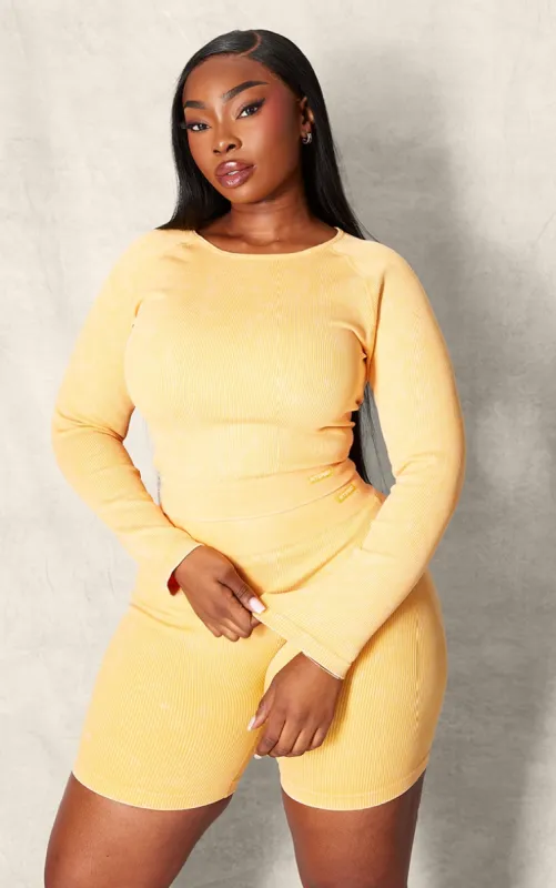 PLT SPORT Plus Mustard Acid Wash Seamless Rib Long Sleeve Sports Top made by Pretty Little Thing