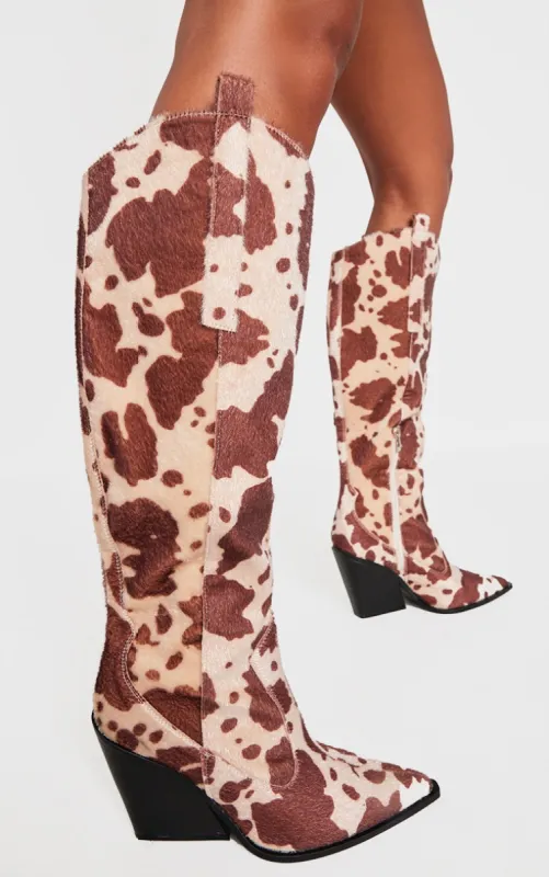 Beige Contrast Cow Print Point Toe Heeled Westerns Knee Boots sold by Pretty Little Thing