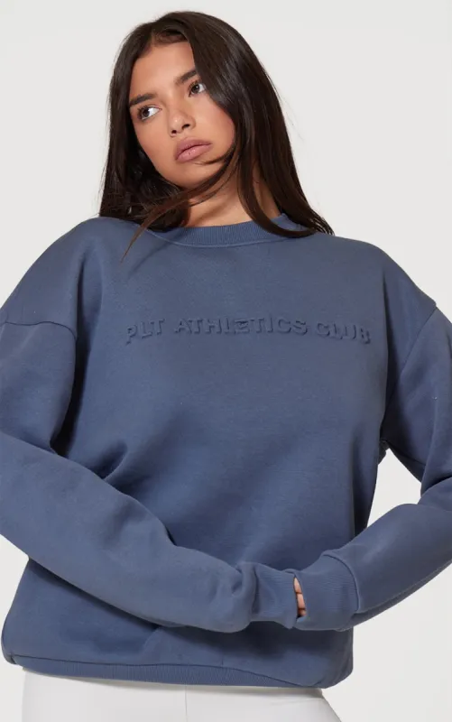 PRETTYLITTLETHING Petrol Blue Athletics Club Embossed Oversized Boxy Sweatshirt sold by Pretty Little Thing