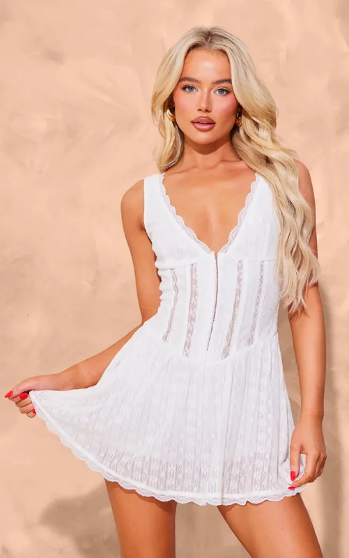 White Textured Lace Corset Detail Floaty Playsuit sold by Pretty Little Thing