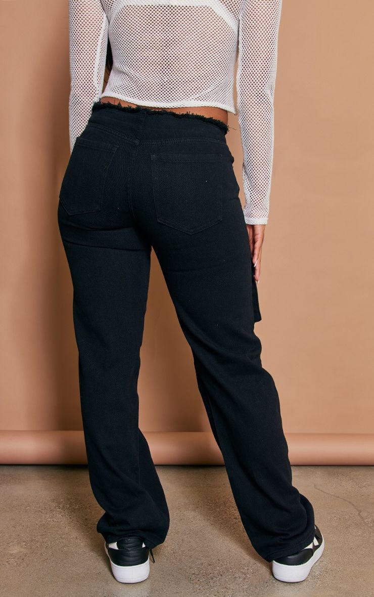 Washed Black Frayed Waistband Cargo Pocket Jeans sold by Pretty Little Thing product image thumbnail 3