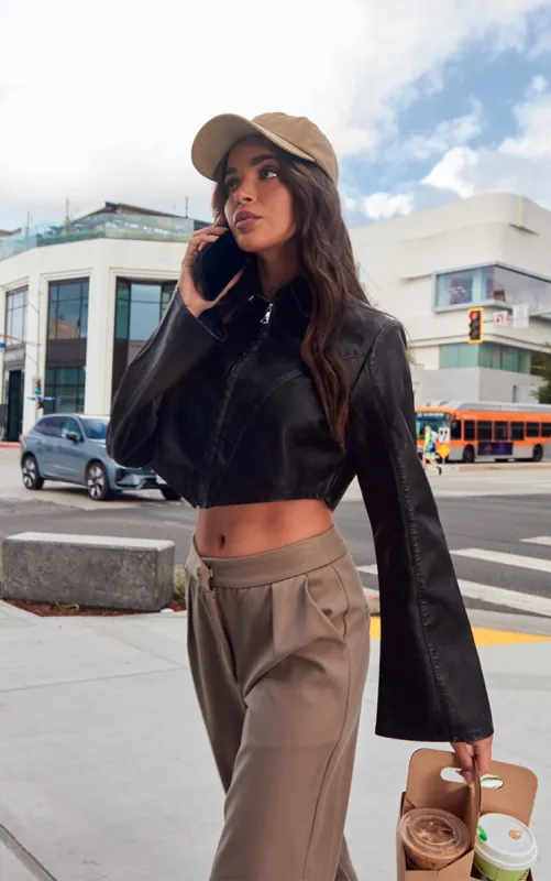 Black Faux Leather Zip Cropped Shirt sold by Pretty Little Thing