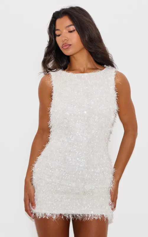 White Faux Feathered Boat Neck Mini Dress sold by Pretty Little Thing