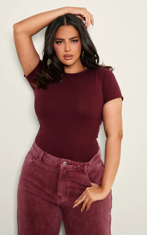Plus Burgundy Premium Cotton Cap Sleeve Fitted Bodysuit sold by Pretty Little Thing