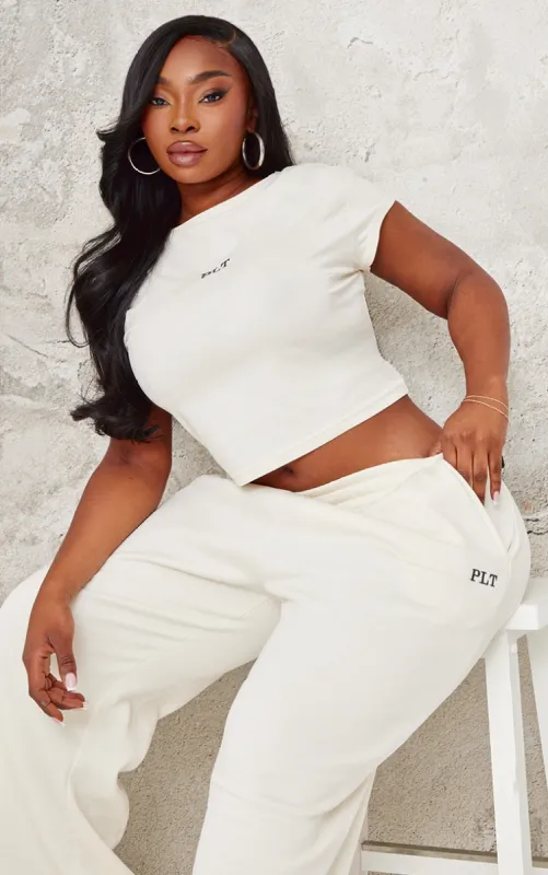 PRETTYLITTLETHING Plus Cream Contrast Embroidery Fitted Cap Sleeve T Shirt sold by Pretty Little Thing