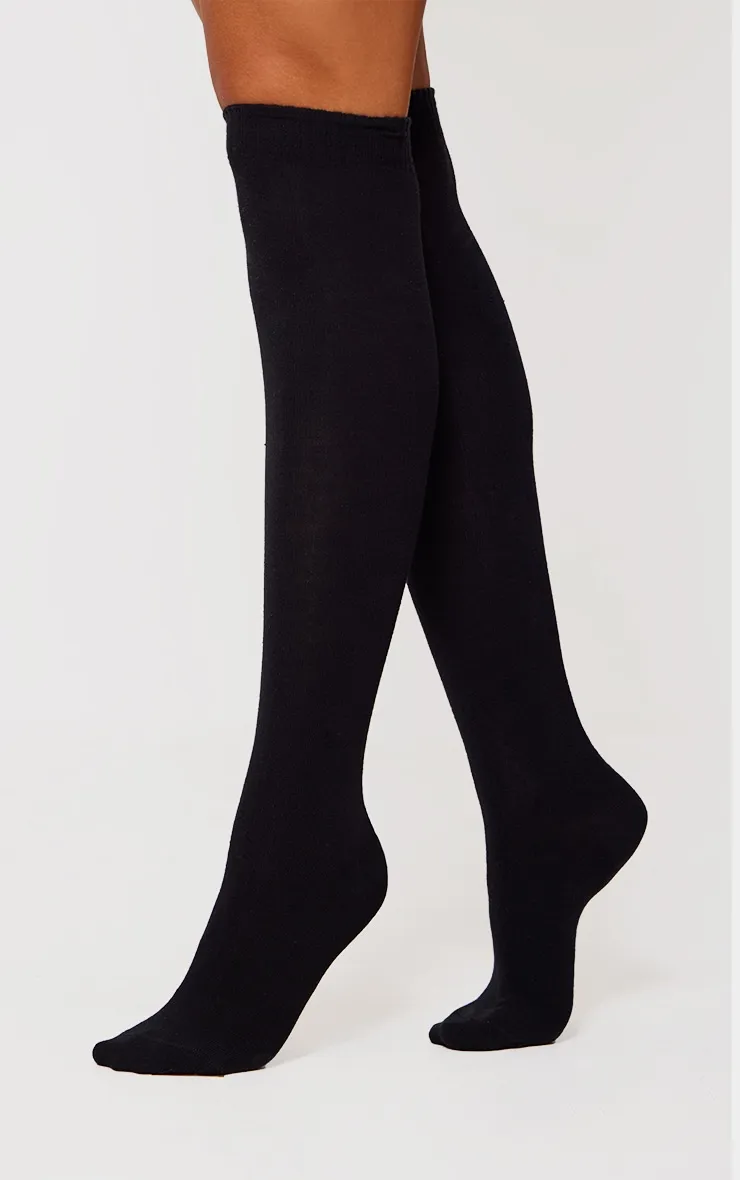 Black Basic Over The Knee Socks sold by Pretty Little Thing