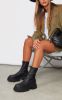 Black Pu Textured Extreme Cleated Sole Ankle Sock Boots, Black sold by Pretty Little Thing