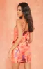 Orange Floral Print Ring Detail Strappy Bodycon Dress sold by Pretty Little Thing