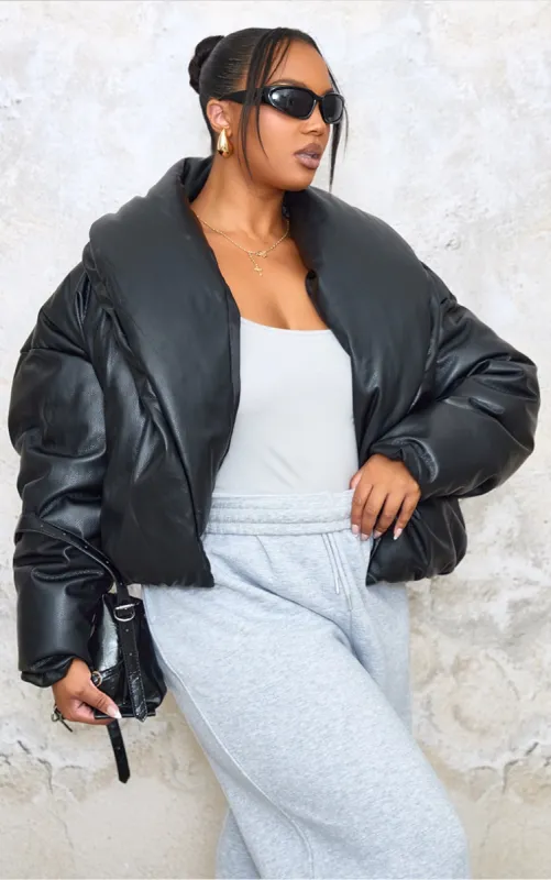 Plus Deep Black Exaggerated Collar PU Cropped Puffer Coat sold by Pretty Little Thing