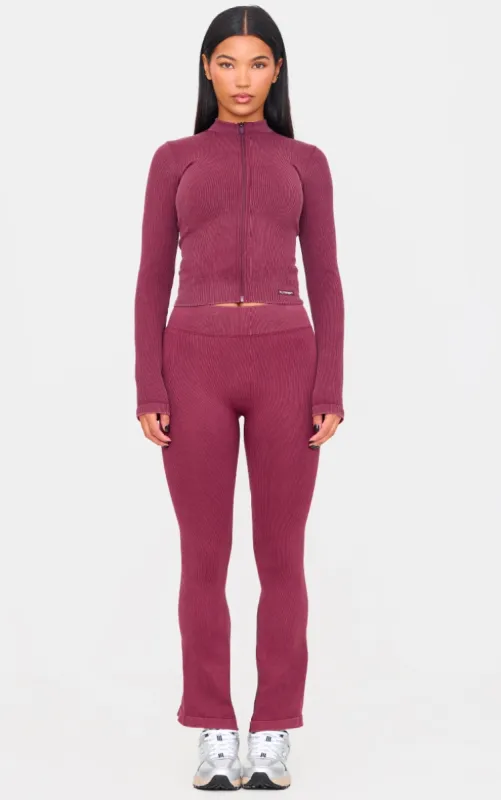 Deep Burgundy Acid Wash Seamless Rib Flare Yoga Pants sold by Pretty Little Thing