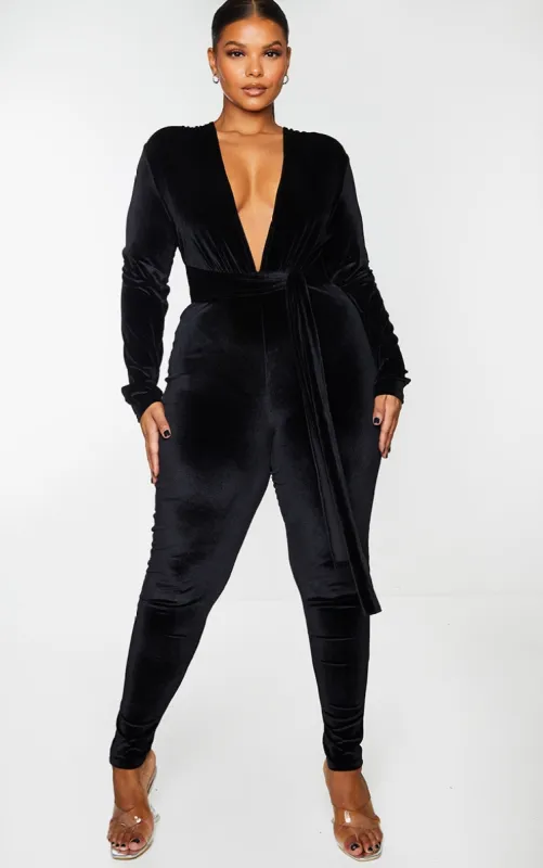 Plus Black Velvet Deep Plunge Tie Waist Jumpsuit sold by Pretty Little Thing