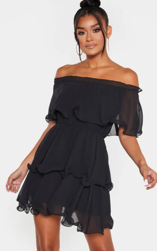 Black Chiffon Bardot Ruffle Tiered Dress sold by Pretty Little Thing
