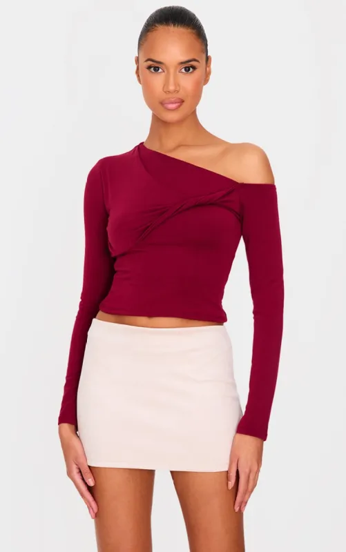 Burgundy Contour Jersey Bardot Twist Detail Long Sleeve Top sold by Pretty Little Thing