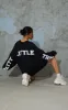 PRETTYLITTLETHING Black Slogan Oversized Sweat Jumper Dress sold by Pretty Little Thing