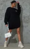 PRETTYLITTLETHING Black Slogan Oversized Sweat Jumper Dress sold by Pretty Little Thing