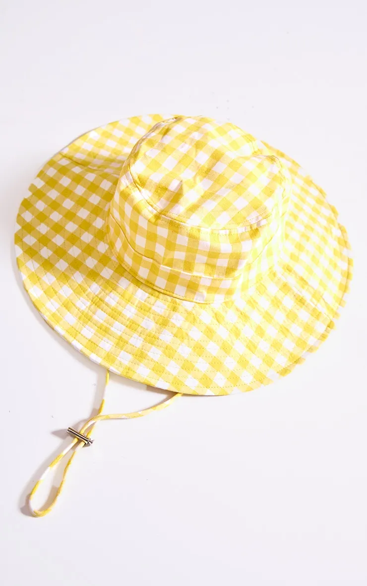 Yellow Gingham Toggle Bucket Hat sold by Pretty Little Thing