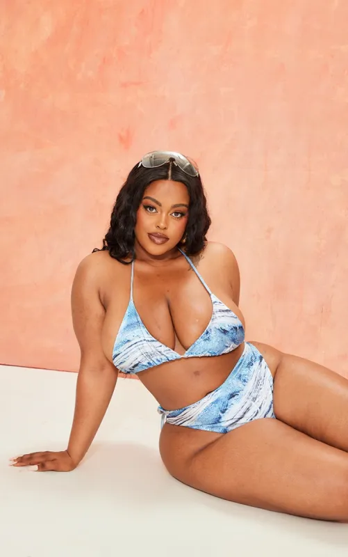 Plus Blue Denim Printed Triangle Bikini Top sold by Pretty Little Thing