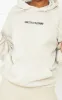 PRETTYLITTLETHING Sand Embroidered Slogan Pocket Hoodie sold by Pretty Little Thing
