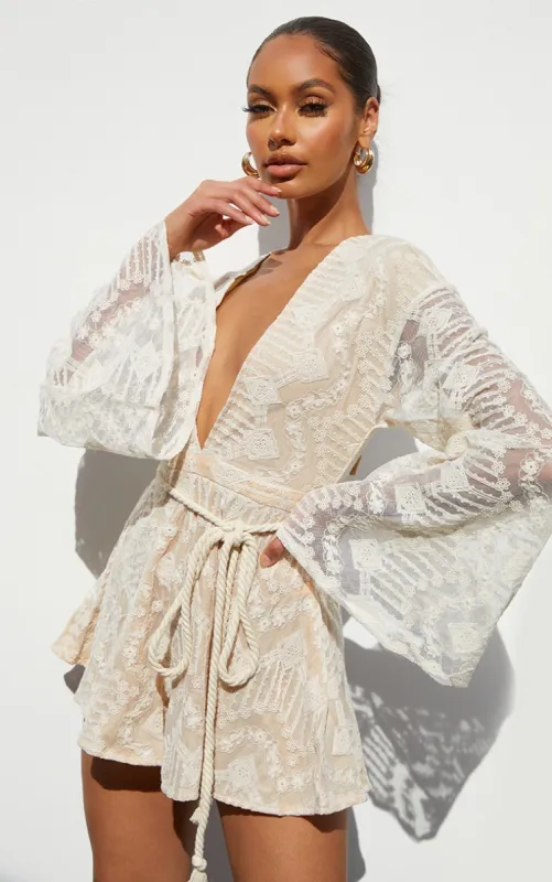 Nude Lace Flare Sleeve Rope Belt Playsuit sold by Pretty Little Thing
