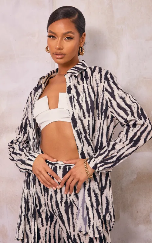 Black Zebra Printed Oversized Shirt sold by Pretty Little Thing
