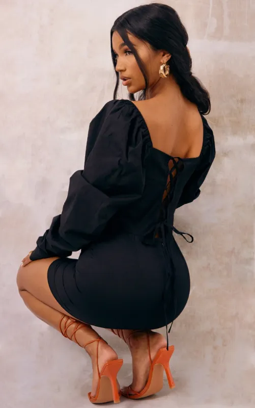 Black Puff Sleeve Lace Up Back Woven Bodycon Dress sold by Pretty Little Thing