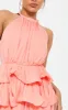 Peach Tiered Frill Short Halterneck Playsuit sold by Pretty Little Thing