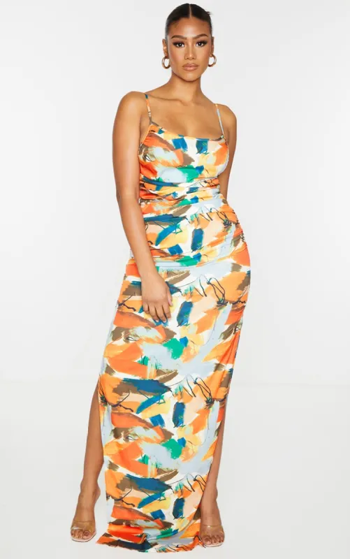 Orange Abstract Print Side Split Ruched Maxi Dress sold by Pretty Little Thing