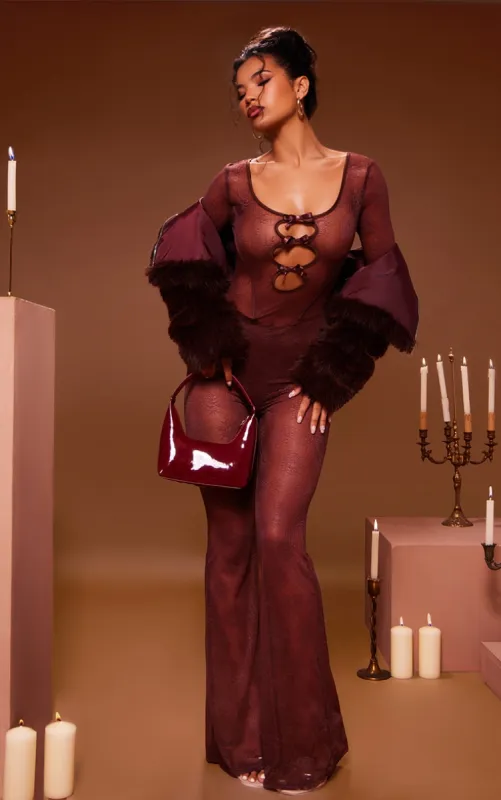 Chocolate Lace Cut Out Bow Detail Long Sleeve Jumpsuit sold by Pretty Little Thing