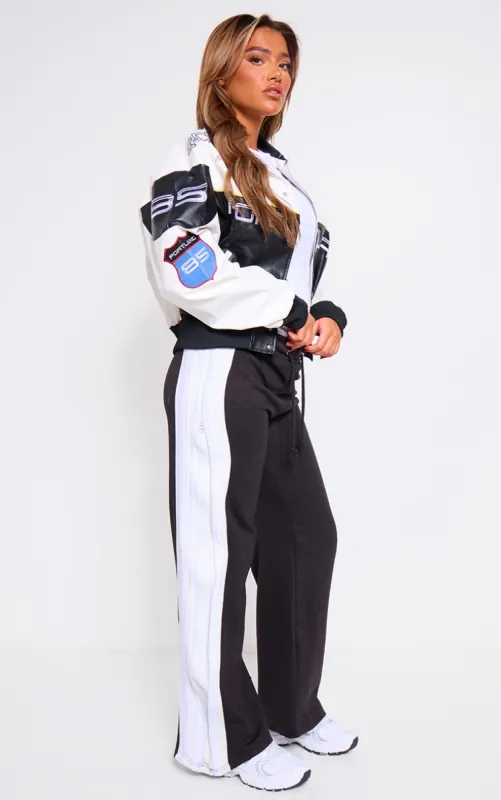 Black Zip Side Wide Leg Joggers sold by Pretty Little Thing