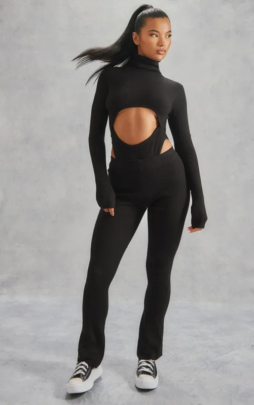 Black Basic Rib Knit Kick Flare Trousers sold by Pretty Little Thing
