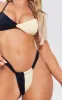 Black And Cream Contrast Bikini Bottoms sold by Pretty Little Thing