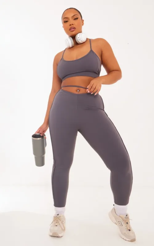 Plus Charcoal Sculpt Strappy Gym Leggings sold by Pretty Little Thing