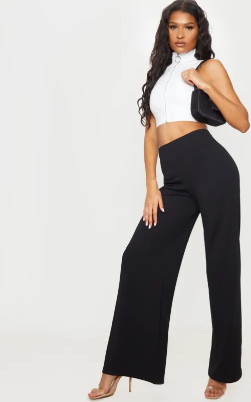 Black High Waisted Wide Leg Trousers sold by Pretty Little Thing
