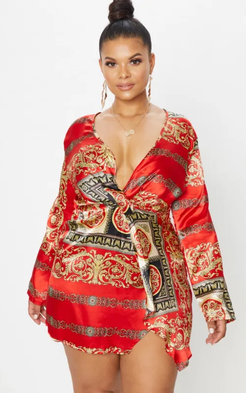 Plus Red Printed Satin Long Sleeve Wrap Dress sold by Pretty Little Thing