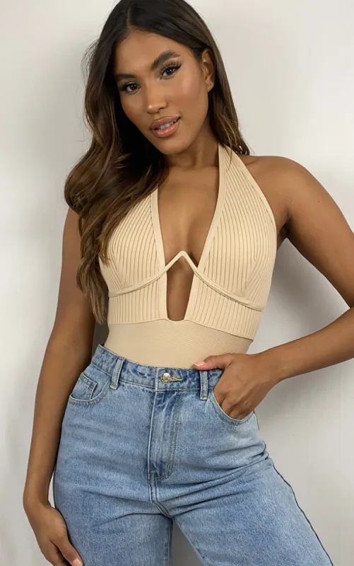Nude Bandage Rib V-Wire Halterneck Bodysuit sold by Pretty Little Thing