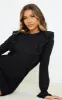 Black Frill Shoulder Ruched Skirt Sweat Jumper Dress sold by Pretty Little Thing