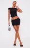 Black Slinky Low Rise Slit Hem Eyelet Detail Micro Mini Skirt sold by Pretty Little Thing