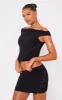 Black Slinky Low Rise Slit Hem Eyelet Detail Micro Mini Skirt sold by Pretty Little Thing